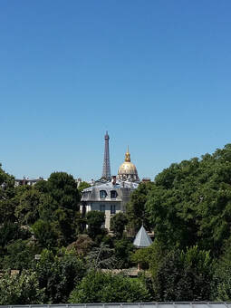 View of the Eiffel Tower and Invalides surrounded by greenery